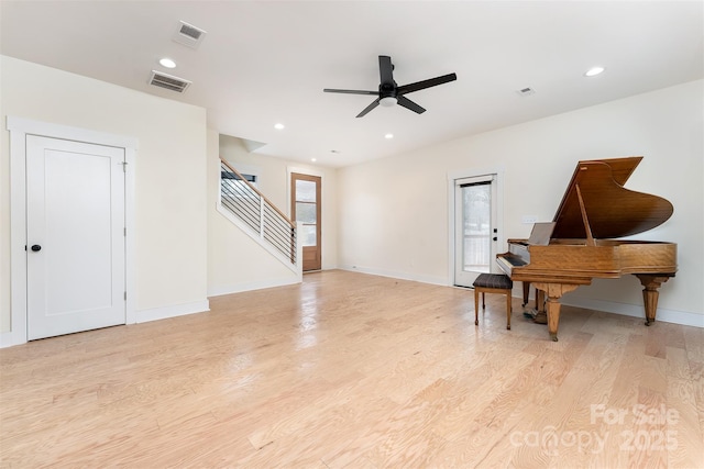 200 Stafford St, Black Mountain, NC 28711 - living area featuring light wood finished floors, visible vents, and stairway