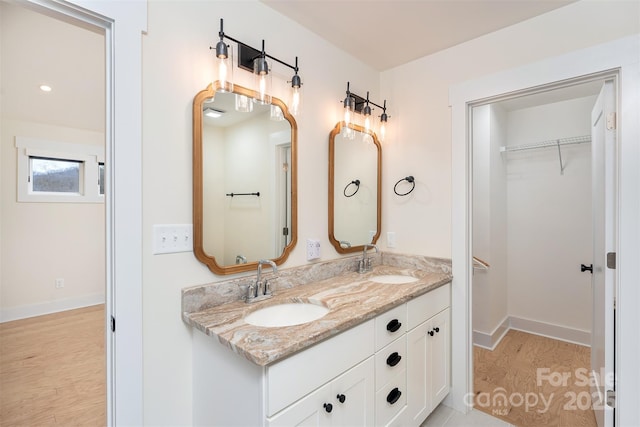 200 Stafford St, Black Mountain, NC 28711 - full bathroom with double vanity, a spacious closet, and a sink