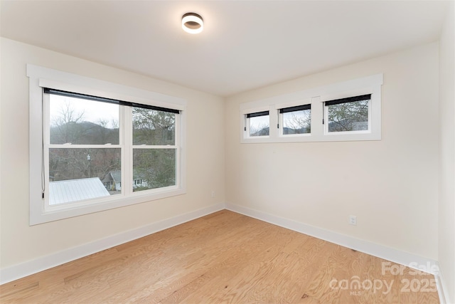 200 Stafford St, Black Mountain, NC 28711 - spare room with light wood finished floors and baseboards
