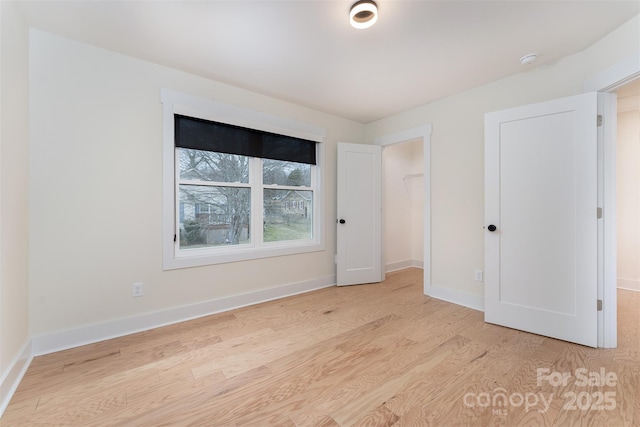 200 Stafford St, Black Mountain, NC 28711 - spare room featuring wood finished floors and baseboards