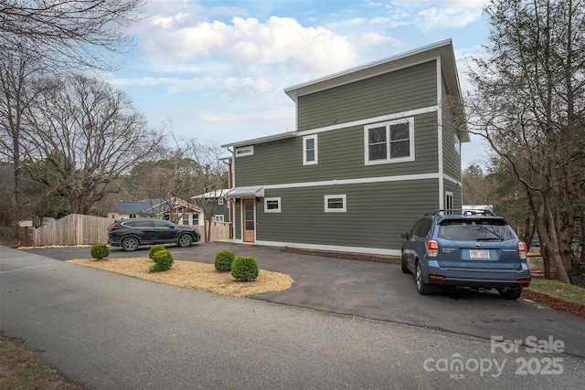 200 Stafford St, Black Mountain, NC 28711 - view of property exterior with aphalt driveway and fence