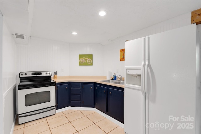 kitchen featuring a sink, visible vents, light countertops, stainless steel electric range, and white fridge with ice dispenser