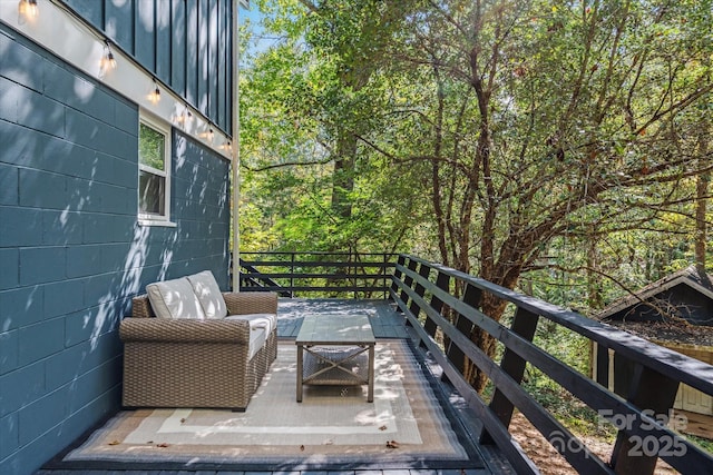 deck with an outdoor hangout area