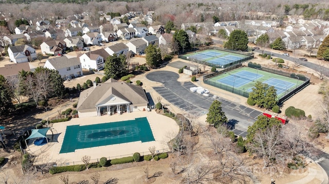 birds eye view of property with a residential view