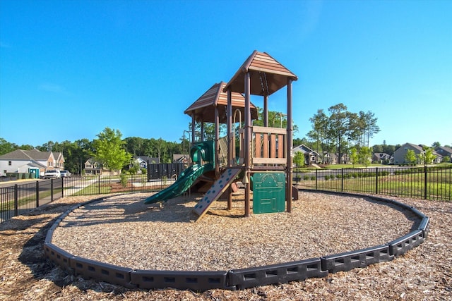 community jungle gym with fence