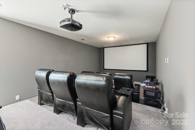 cinema room with carpet and visible vents