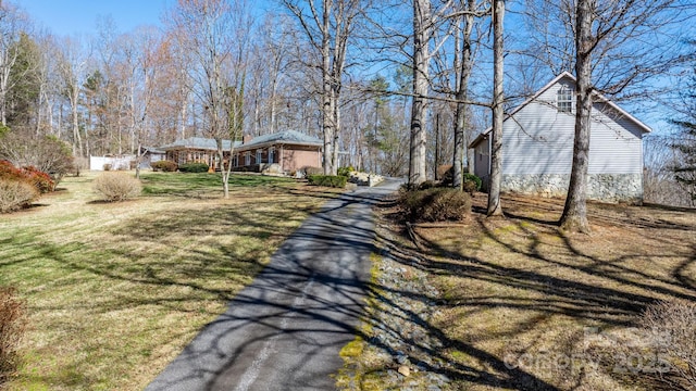 view of street featuring driveway