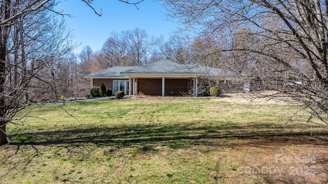 exterior space featuring a yard