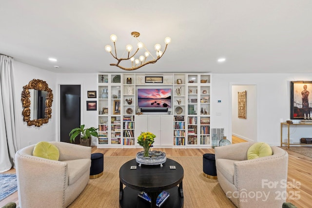 living room featuring wood finished floors and recessed lighting