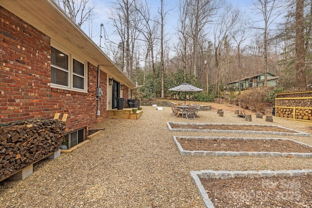 view of yard with central AC unit