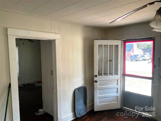 doorway to outside with dark wood finished floors