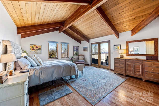 bedroom with lofted ceiling with beams, light wood-style floors, wood ceiling, and access to outside