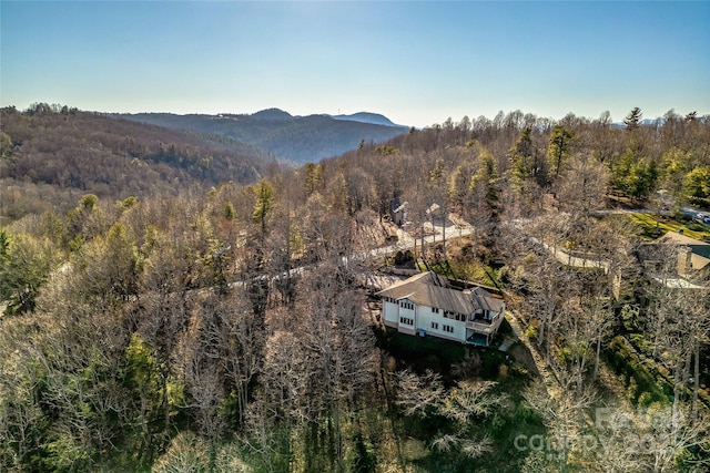 property view of mountains with a forest view