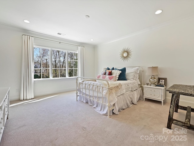 bedroom featuring light carpet, crown molding, visible vents, and recessed lighting