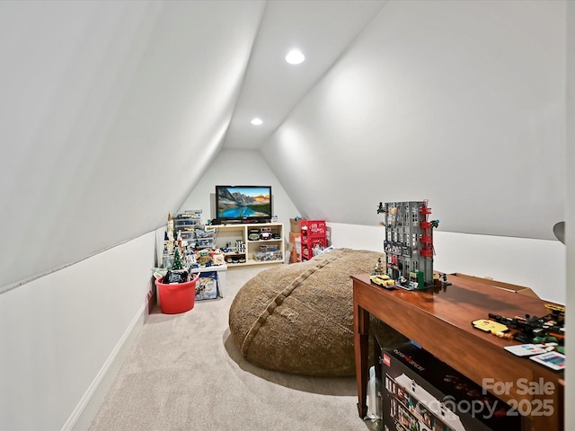 interior space with lofted ceiling, recessed lighting, carpet flooring, and baseboards