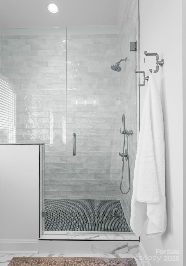 full bath featuring a stall shower