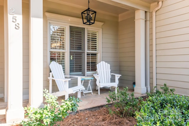 doorway to property featuring a porch