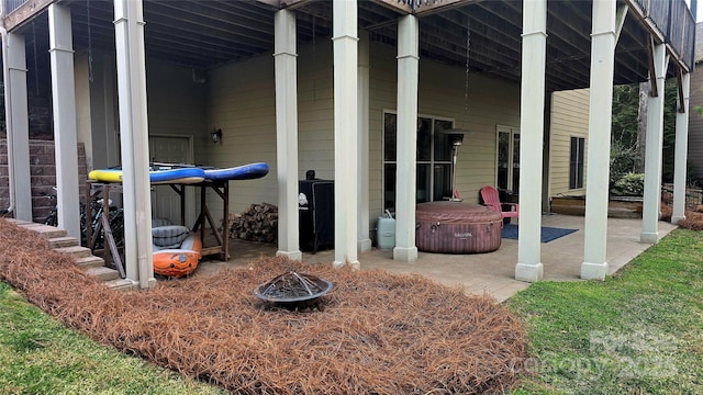 view of patio / terrace with an outdoor fire pit