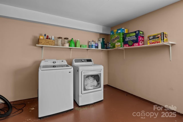 laundry area with laundry area and washer and dryer