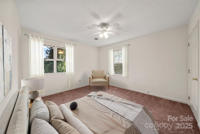 bedroom featuring carpet floors, a ceiling fan, and baseboards