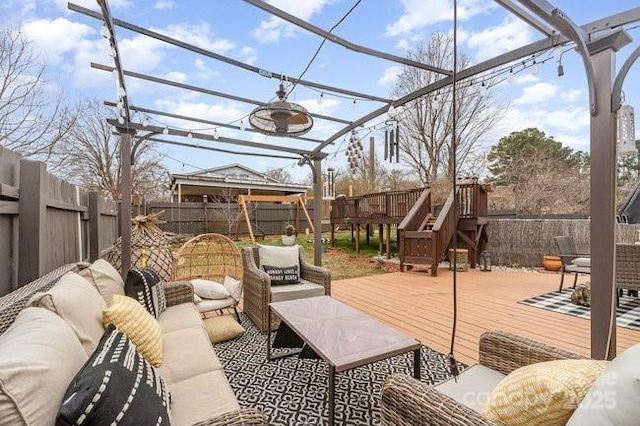 view of patio with a fenced backyard, an outdoor hangout area, a deck, and a pergola