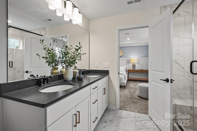 bathroom with ensuite bathroom, marble finish floor, a sink, and visible vents