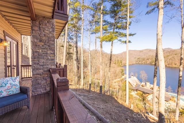 deck featuring a water view