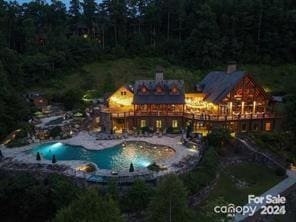 pool with a patio area