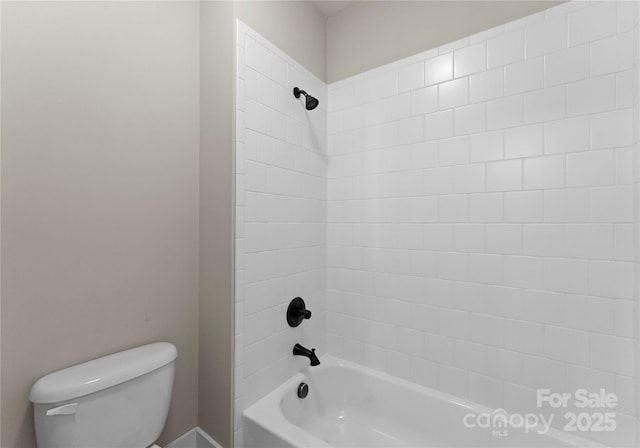 full bathroom with toilet and  shower combination