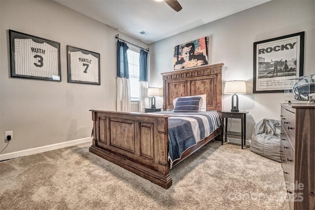 bedroom featuring a ceiling fan, carpet flooring, visible vents, and baseboards