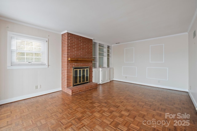 unfurnished living room featuring ornamental molding, a brick fireplace, visible vents, and baseboards