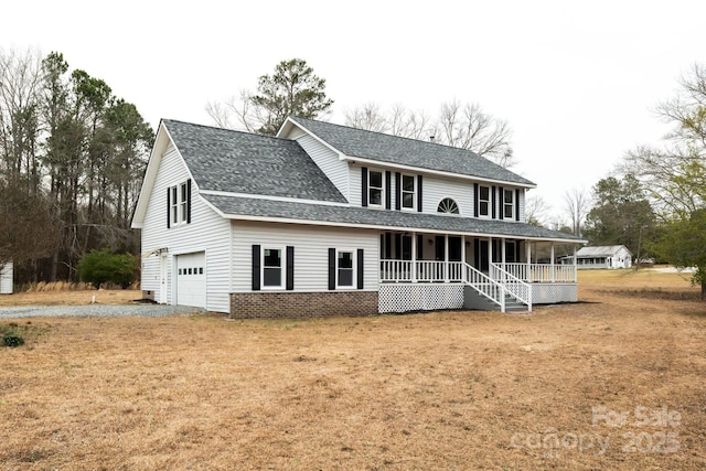 rear view of house featuring a lawn, driveway, a porch, a shingled roof, and a garage