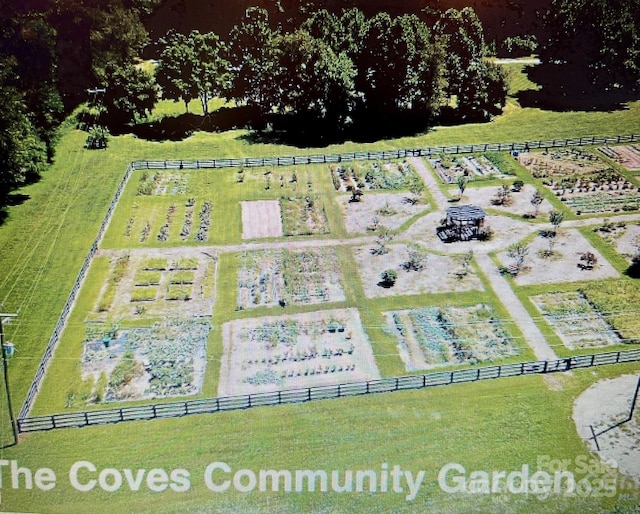 birds eye view of property featuring a rural view