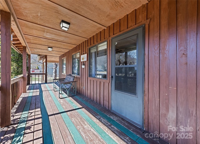 wooden terrace with covered porch