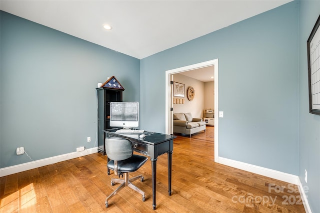 office area with wood-type flooring, baseboards, and recessed lighting