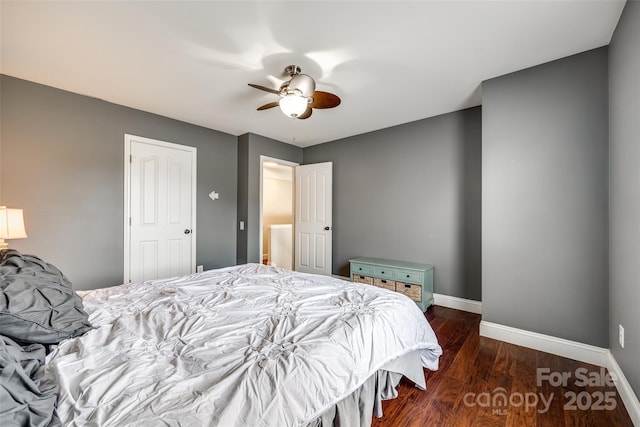 bedroom featuring a ceiling fan, baseboards, and wood finished floors