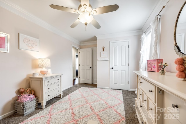 carpeted bedroom featuring baseboards, ornamental molding, and ceiling fan