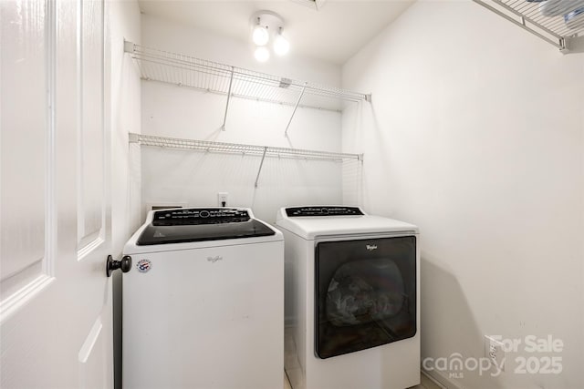 laundry room featuring laundry area and washing machine and dryer