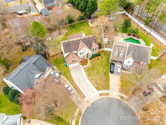 birds eye view of property with a residential view