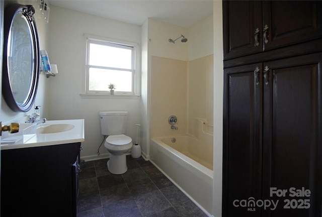 full bath featuring baseboards, tub / shower combination, vanity, and toilet