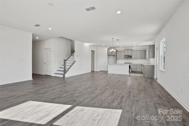 13744 Roderick Dr Unit 173, Huntersville, NC 28078 - unfurnished living room featuring recessed lighting, stairs, and visible vents
