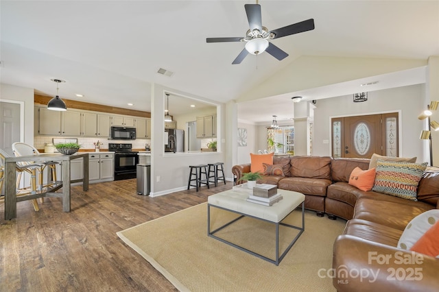 living room featuring visible vents, dark wood-style floors, ceiling fan, vaulted ceiling, and recessed lighting