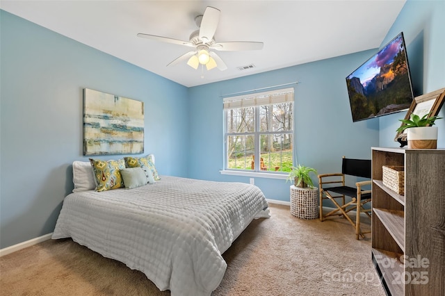 bedroom featuring carpet, visible vents, and baseboards