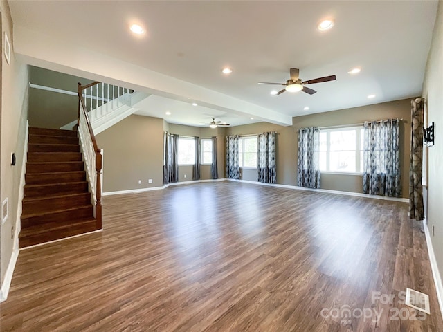 unfurnished living room with recessed lighting, wood finished floors, visible vents, baseboards, and stairs