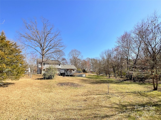 view of yard featuring a deck