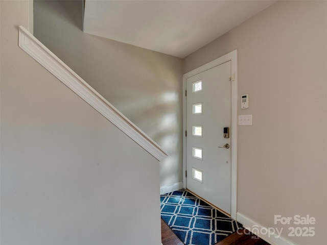 entrance foyer with baseboards