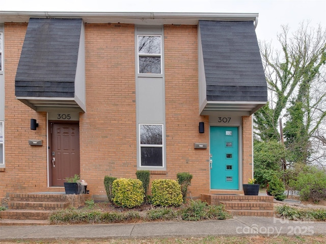 view of front of property with brick siding