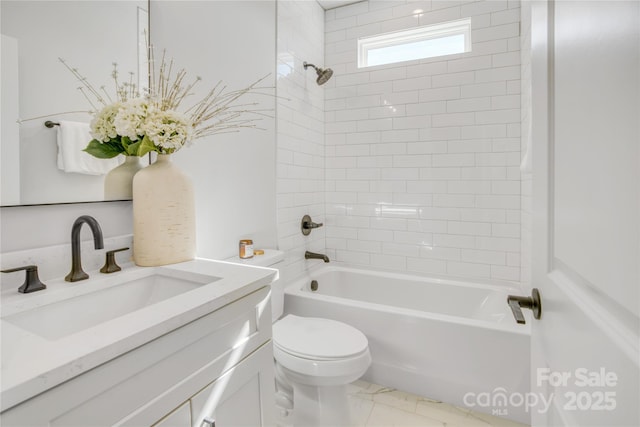 full bath featuring marble finish floor, shower / bath combination, vanity, and toilet