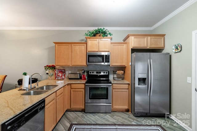 kitchen featuring light stone counters, light wood-style flooring, a sink, appliances with stainless steel finishes, and crown molding