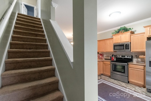 staircase with ornamental molding